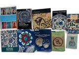 a lot of books that are sitting on a table