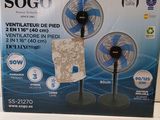 the box is open to show the contents of a small table fan