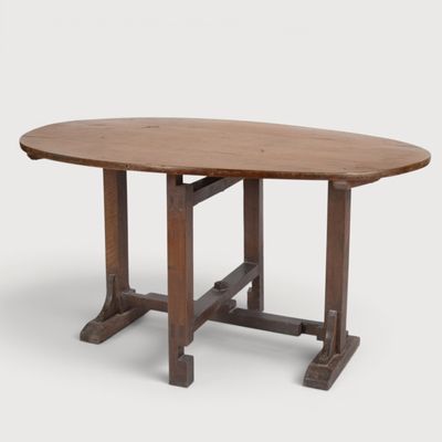 a close up of a table with a wooden top on a white background