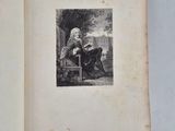 an old book with a picture of a woman sitting on a chair