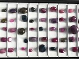 a picture of a tray with many different colored stones
