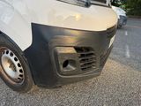 a white van parked on the side of the road