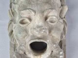 une image représentant une sculpture représentant une tête de lion