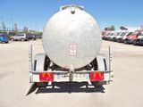an image of a large tanker truck parked in a parking lot