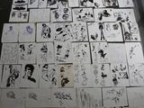 a lot of drawings on the floor of this room