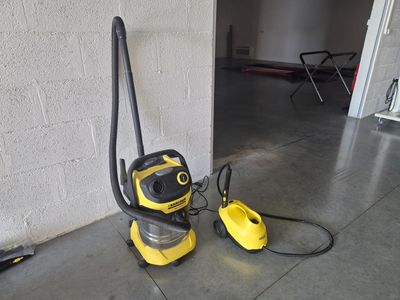 a yellow and black vacuum and a black and yellow vacuum
