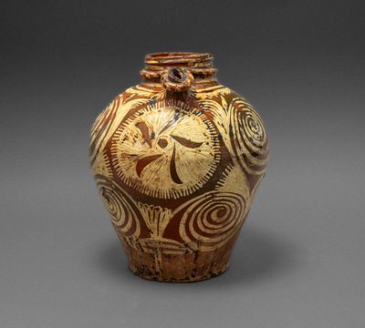 an image of a vase with a design on it