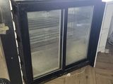 an image of a kitchen with a refrigerator in it
