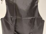 an image of a black vest on a hanger