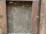a picture of a picture of a wooden frame on the wall