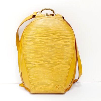 Louis VUITTON. Modèle "Mabillon" Sac en cuir et cuir épi jau…