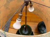 a lamp that is sitting on a wooden table