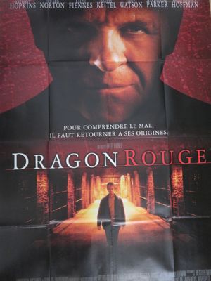 a movie poster of a man walking down a street next to a building