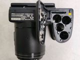 a close up of a camera with a remote control