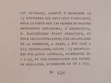 an open book with a black and white text on it
