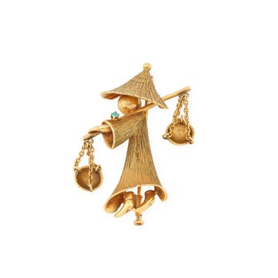 une image représentant une figurine plaquée or tenant une balance