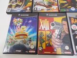 many video games that are sitting on a table