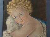 painting of a baby holding a sheep in a blue frame