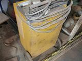 a yellow box that has a bunch of wires in it