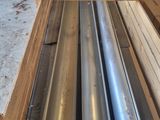 several pieces of wood are stacked on top of each other in a room