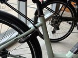 a bike that is parked in front of a building