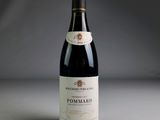 a bottle of wine that is sitting on a table