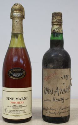 two bottles of wine sitting next to each other on a table