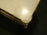 a white table with a mirror on top of it