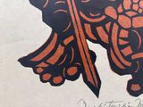 le dessin d'un homme tenant une épée à la main