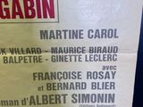a poster on the wall of a restaurant advertising jean gabin