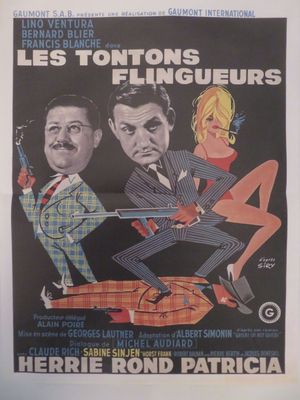 une affiche du film « » mettant en scène deux hommes et une femme