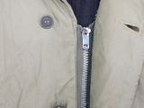 a close up of a jacket with a zipper on it