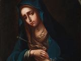 un tableau représentant une femme tenant un chapelet dans ses mains