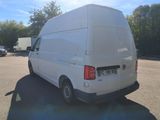 a white van that is parked in a parking lot