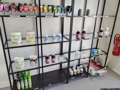a shelf with many different types of products on it