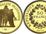 a gold coin with an image of an angel and a wreath on it