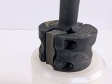 an image of a black and white photo of a pipe cutter