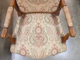 a chair that is sitting in the corner of a room