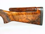 a close up of a rifle on a white background with a white background