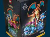a box with a toy dragon riding a motorcycle with a dragon on it