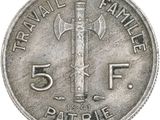 an image of a five cents coin with an axe on it