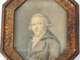 une vieille photo d'un homme en costume-cravate