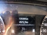 a close up of the dashboard of a car in the rain
