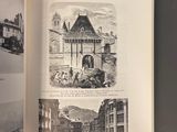 an open book with black and white images of buildings and people