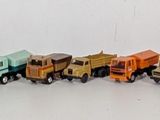 many different colored origami birds lined up in a row