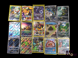 a lot of pokemon cards that are on the table