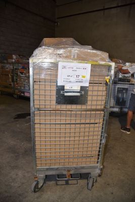 a cart with a lot of boxes on it in a warehouse