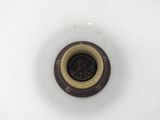 a white sink with a brown drain and a brown faucet