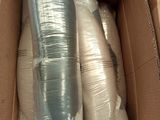 a cardboard box filled with two rolls of plastic wrap