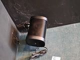 an image of a bathroom with a toilet and a trash can